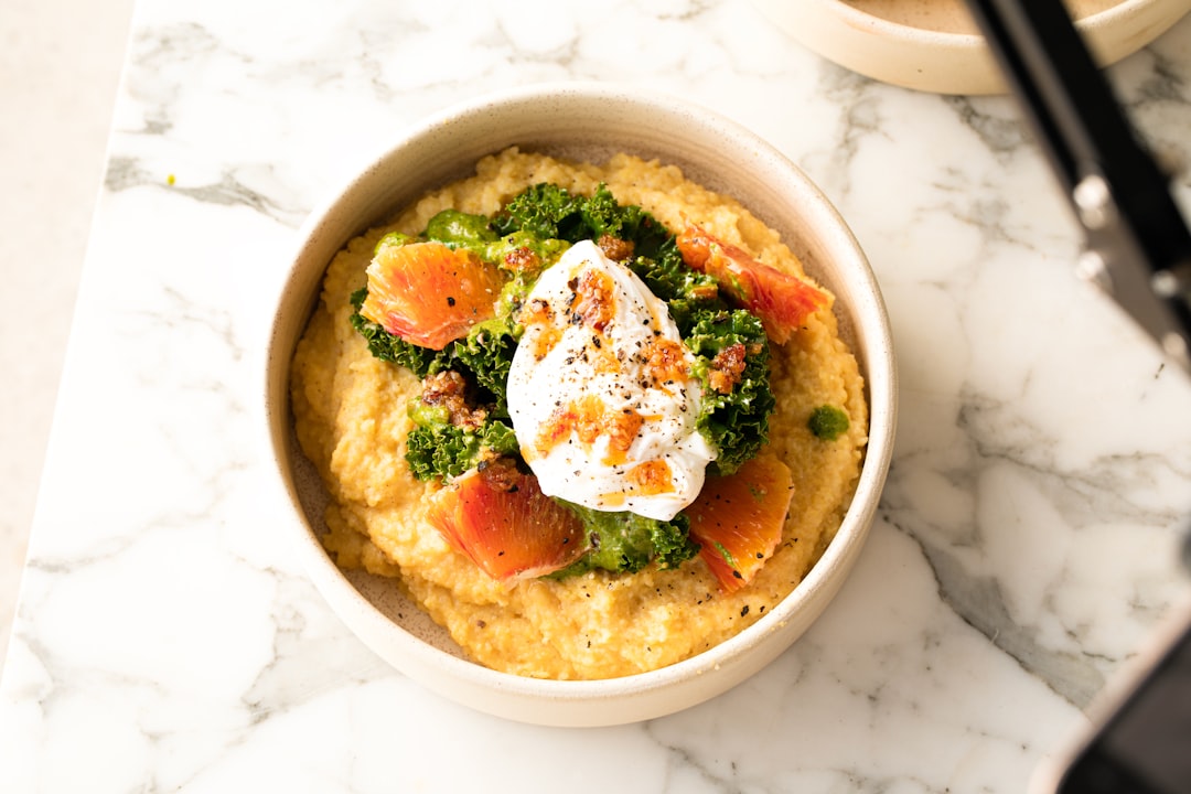 Parmesan Polenta with poached egg, kale and blood orange by Bakd&Raw, Karolin Silja Baitinger